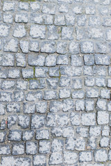 Dark texture of stone floor close up