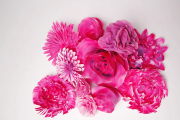 Pile of purple flowers isolated on white background, closeup shot