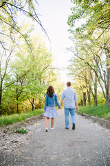 Fototapeta premium young couple walking in the park