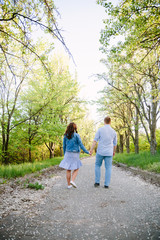 young couple walking in the park