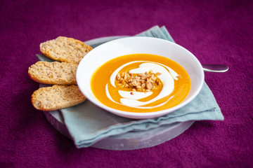 Homemade carrot and sweet potato cream soup