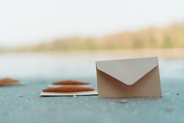 many od envelope imply for sending mail on sand texture background.