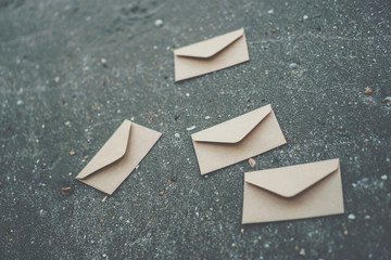 many od envelope imply for sending mail on sand texture background.