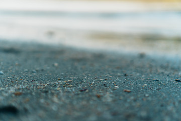 Copy space of grey sand and blue color summer beach background.