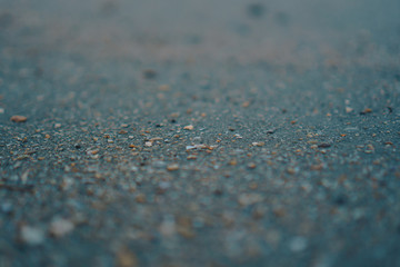 Fototapeta na wymiar Copy space of grey sand and blue color summer beach background.