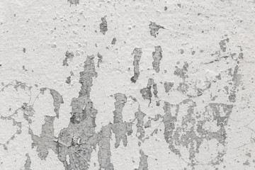 Abstract background, old cracked plaster wall, brown texture, paint stains and cracks