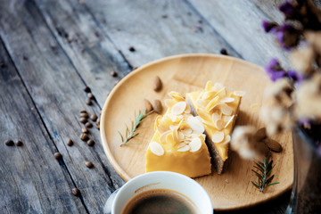 Cake and coffee on wooden.