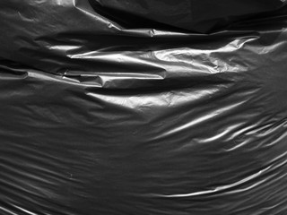 Texture of a black plastic bag