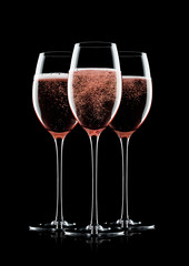 Rose pink champagne glasses with bubbles