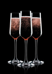 Rose pink champagne glasses with bubbles