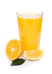 Glass of organic fresh orange juice with fruits