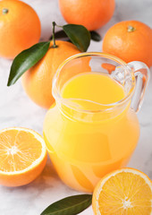 Glass jar of raw organic fresh orange juice