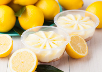 Plastic jar with lemon cheesecake mousse dessert