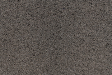 Picture of texture of asphalt on parking lot.