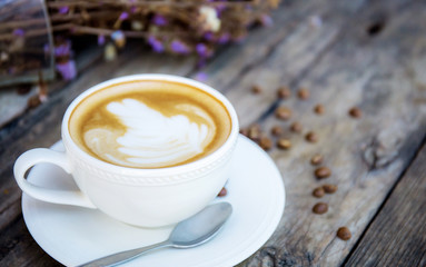 Coffee cup on table.