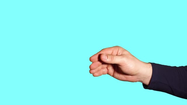 Close-up hand gesture - sign of blah blah blah. Male hands showing sign on a blue background.