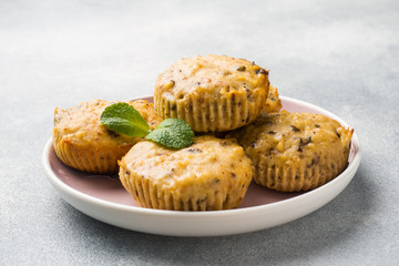 Oatmeal vegetarian muffins with blueberries and nuts on a plate. Concept healthy Breakfast.