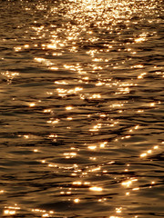 Abstract gold water sunset reflection