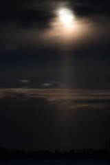 Obraz premium Moonrise and light pole from the moon on the ground