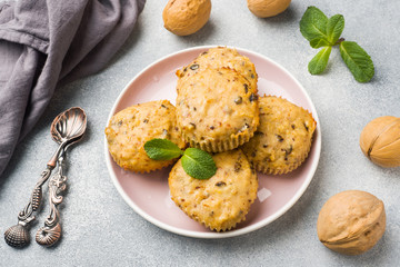 Oatmeal vegetarian muffins with blueberries and nuts on a plate. Concept healthy Breakfast.