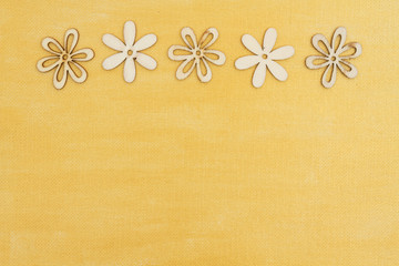 Wood flower petals on hand painted distressed gold background