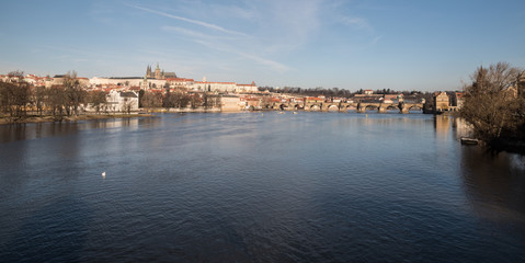 Fototapeta na wymiar Vltava river, Karluv most bridge and Hradcany with Prazsky hrad castle in Prague city in Czech republic