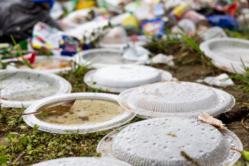 Indiscriminate litter of plastic non-biodegradable at garbage dump