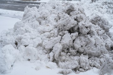 Dirty pile of snow, selective focus