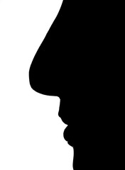 Buddha face statue silhouette closeup