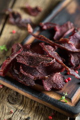 Beef Jerky on a Rustic Wooden Table
