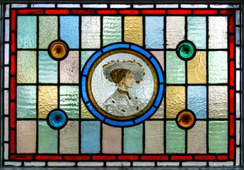 Stained glass window. Portrait of women in stained glass