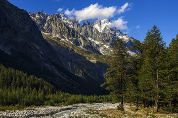 Valley, stones and river in the mountains near Mont Blanc