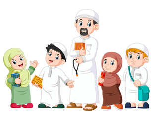 Happy moslem kid showing with holding holy quran