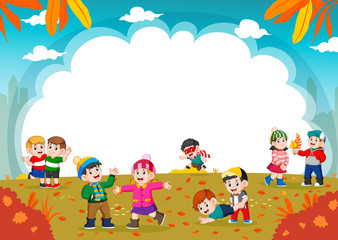 Obraz na płótnie Canvas Happy children playing with autumn leaves