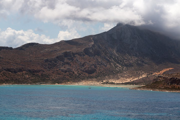 Greek island of Crete. Sea. Sand. Rocks. Mountains.