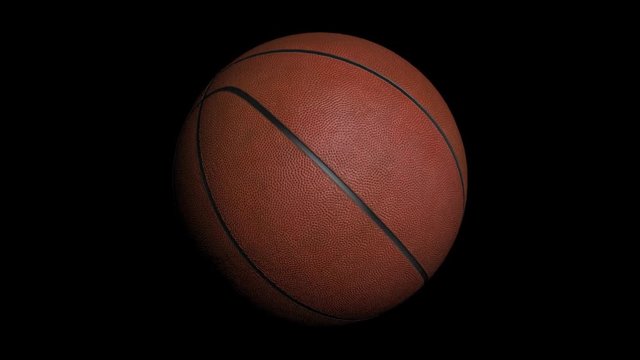 Loopable rotating basket ball with alpha channel. Basketball ball on black background