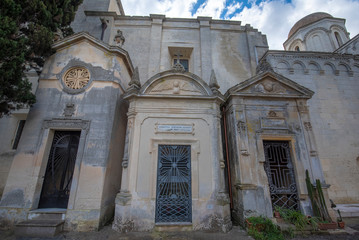 Old crypts and tombs in baroque style in Old Roman cemetery park (Cimitero Storico) in Lecce, Puglia, Italy. A region of Apulia