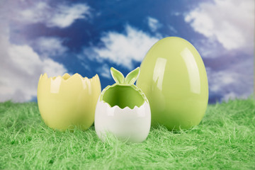Easter, colorful eggs on a wooden table.