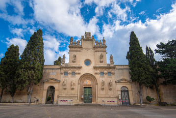 Fototapeta na wymiar Saint Nicolo and Cataldo Church (Chiesa dei Santi Niccolo e Cataldo) in the old cemetery park (Cimitero Storico) in Lecce, Puglia, Italy. A region of Apulia