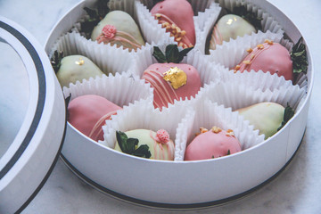 Gourmet chocolate covered strawberries in a round gift box