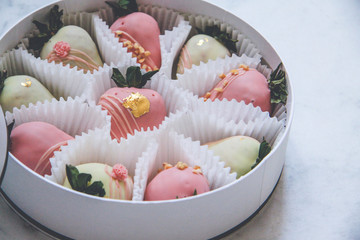 Gourmet chocolate covered strawberries in a round gift box