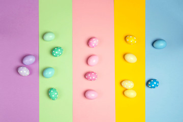 Easter eggs on multicolored background.