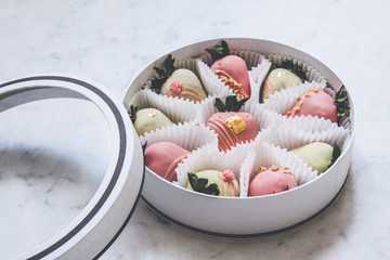 Gourmet chocolate covered strawberries in a round gift box