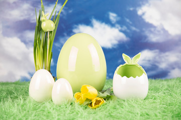 Easter, colorful eggs on a wooden table.