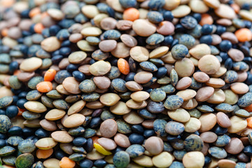 Colorful mix of lentils legumes ready for cooking, tasty vegetarian food commonly used in South Asian cuisine