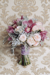 Delicate wedding bridal bouquet, floral arrangement of flowers to celebrate the holiday decor