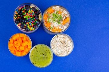 Healthy healthy food. Muesli, oatmeal, smoothies, berries, fruits, vegetables.