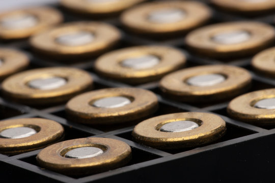 Pile of pistol bullets. The concept of limiting the spread of small arms.