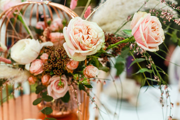 Wedding flowers, bridal bouquet closeup. Decoration made of roses, peonies and decorative plants, close-up, selective focus, nobody, objects