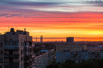 Fototapeta na wymiar Aerial view of apartment buildings with beautiful clouds